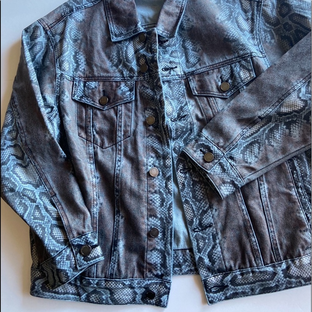 Never worn jean jacket.
